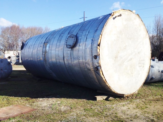 ***SOLD*** used 25,000 Gallon Stainless Steel storage tank. 12' dia. x 30' T/T. Flat bottom and Cone Top. Tank has a dimple jacket that goes 14' up the side wall from the bottom and (4) turns of internal coil inside. 